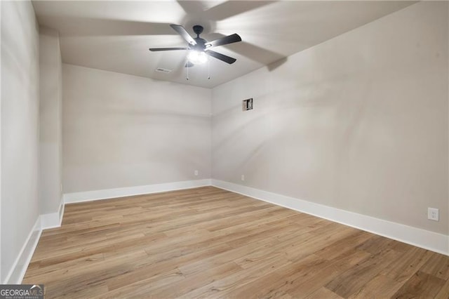 6326 Point Twenty Two, Gainesville, GA 30506 - spare room with ceiling fan, baseboards, and wood finished floors