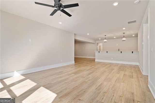 6326 Point Twenty Two, Gainesville, GA 30506 - unfurnished living room with visible vents, baseboards, ceiling fan, light wood-type flooring, and recessed lighting