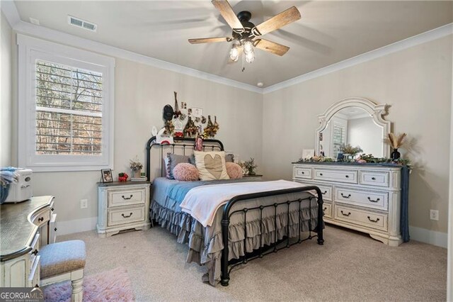 bedroom featuring light carpet, baseboards, visible vents, and crown molding