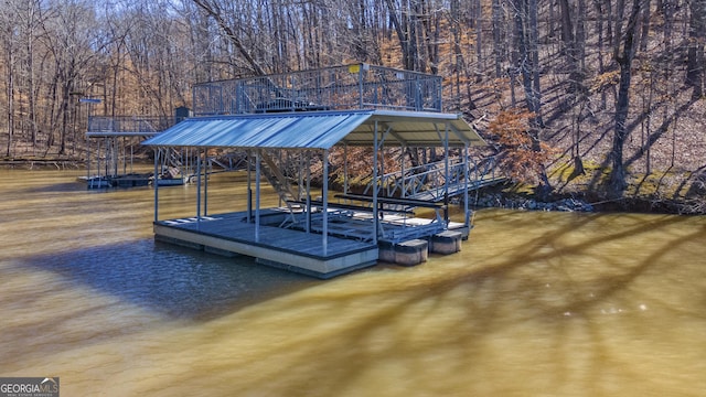 view of dock with a water view