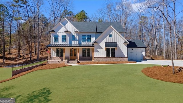 6326 Point Twenty Two, Gainesville, GA 30506 - modern farmhouse style home with brick siding, board and batten siding, driveway, and a standing seam roof