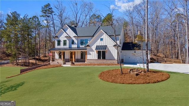 6326 Point Twenty Two, Gainesville, GA 30506 - modern inspired farmhouse featuring a standing seam roof, board and batten siding, concrete driveway, a front yard, and metal roof
