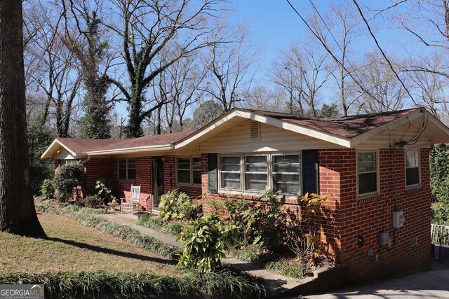 ranch-style home with brick siding