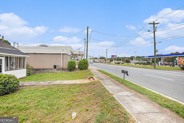 view of street with curbs and sidewalks