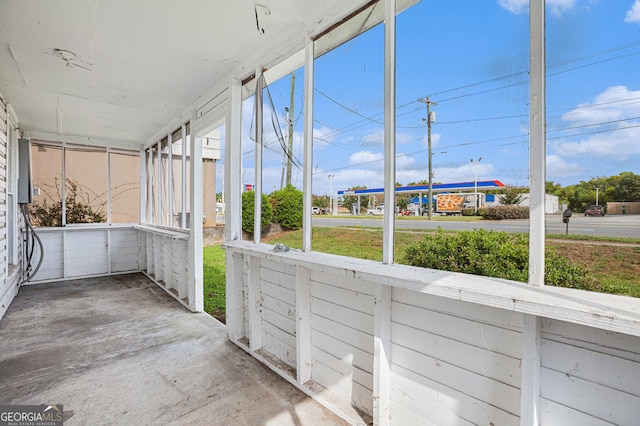 unfurnished sunroom featuring a healthy amount of sunlight