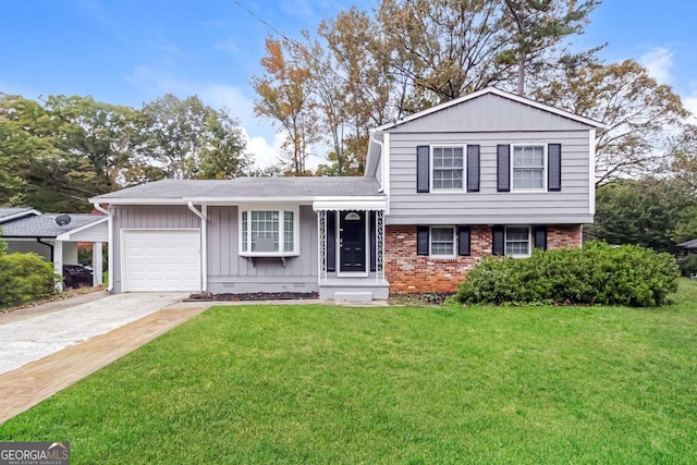 split level home with a garage, a front yard, concrete driveway, and brick siding