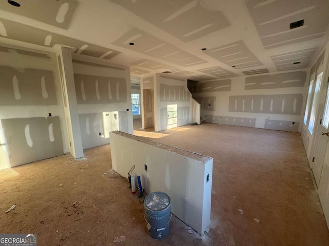 unfurnished room featuring plenty of natural light