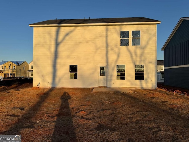 rear view of house with a patio