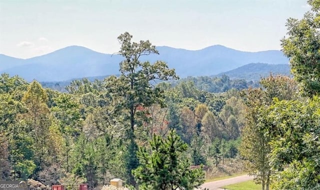 mountain view with a view of trees