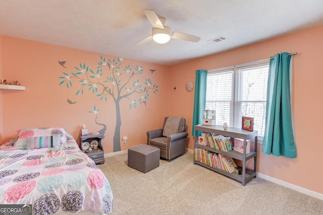 bedroom featuring a ceiling fan, carpet flooring, visible vents, and baseboards