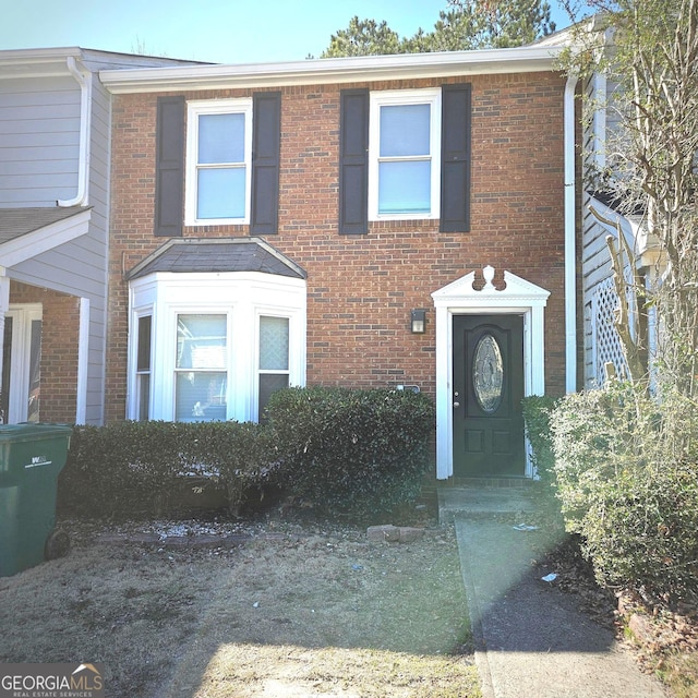 view of front of property with brick siding