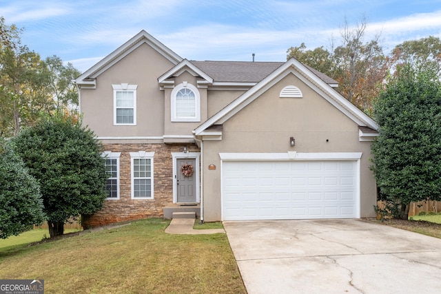 traditional-style home with stucco siding, concrete driveway, a front yard, a garage, and stone siding