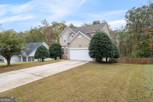 view of front of house with concrete driveway, a front lawn, fence, and stucco siding