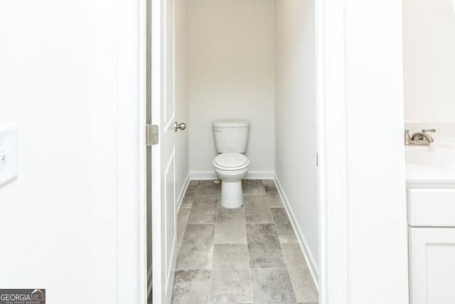 34 Russet Way Lot 57, Newnan, GA 30263 - bathroom featuring toilet, a sink, tile patterned flooring, and baseboards