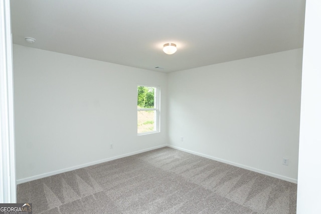 34 Russet Way Lot 57, Newnan, GA 30263 - carpeted spare room featuring baseboards and a smoke detector
