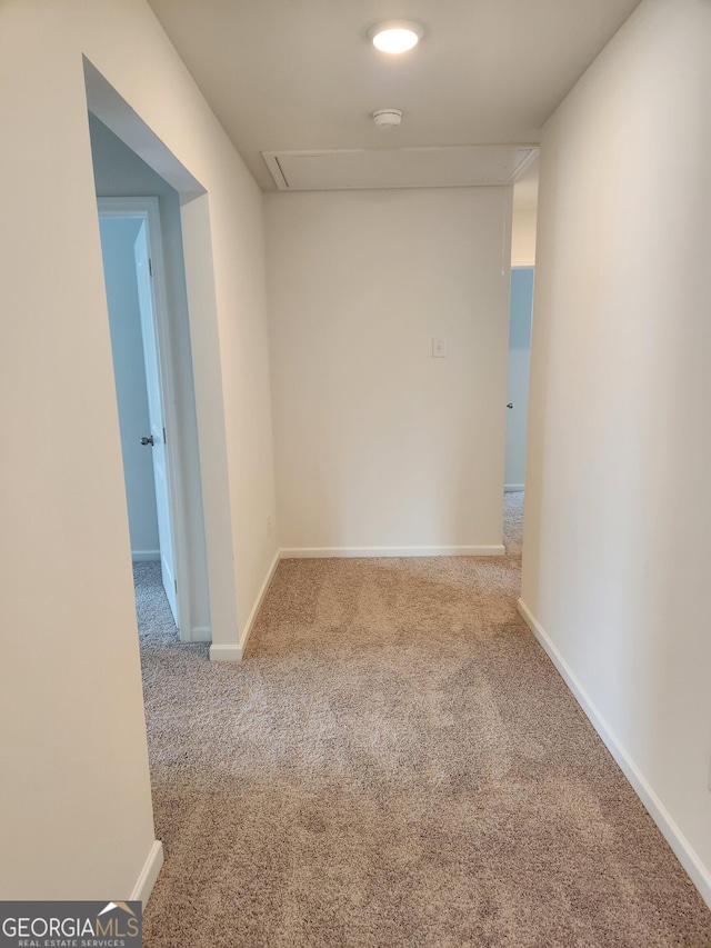 34 Russet Way Lot 57, Newnan, GA 30263 - spare room with attic access, carpet flooring, a smoke detector, and baseboards