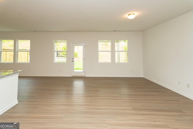 34 Russet Way Lot 57, Newnan, GA 30263 - spare room with baseboards and light wood-style flooring