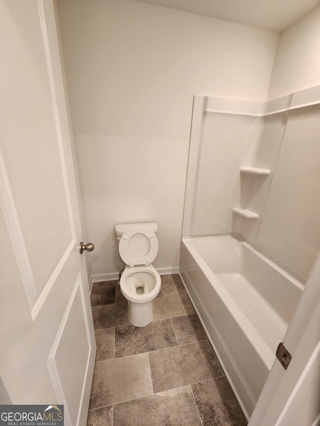 34 Russet Way Lot 57, Newnan, GA 30263 - full bathroom with toilet, baseboards, and stone finish flooring