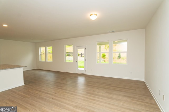 34 Russet Way Lot 57, Newnan, GA 30263 - empty room featuring light wood-type flooring and baseboards