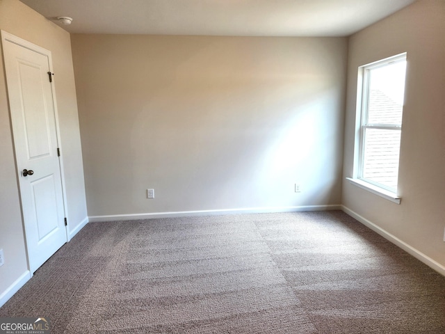 34 Russet Way Lot 57, Newnan, GA 30263 - empty room featuring carpet flooring, a smoke detector, and baseboards