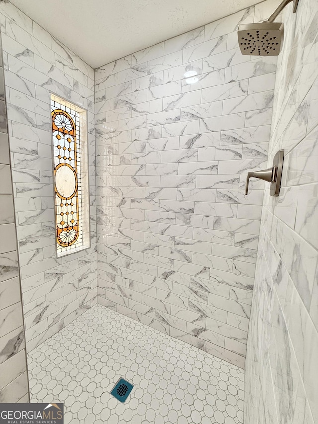 bathroom featuring toilet, baseboards, and wood finished floors