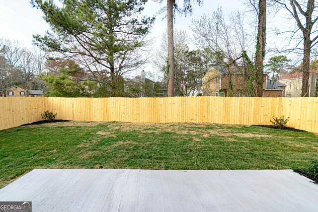 view of yard featuring a fenced backyard