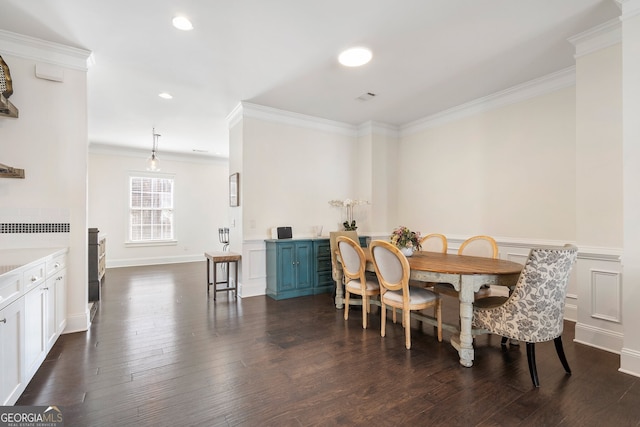 dining room featuring visible vents, dark wood finished floors, crown molding, and recessed lighting