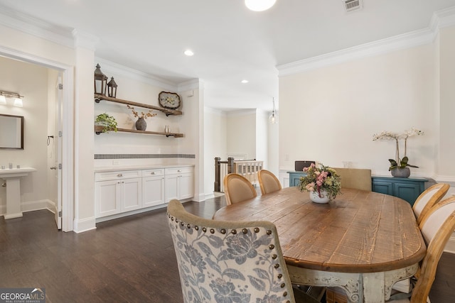 dining area with dark wood finished floors, recessed lighting, visible vents, ornamental molding, and baseboards