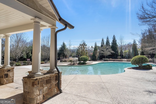 pool featuring a patio