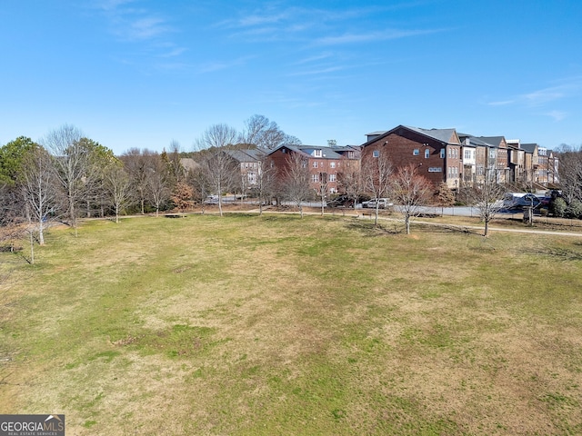 view of yard featuring a residential view