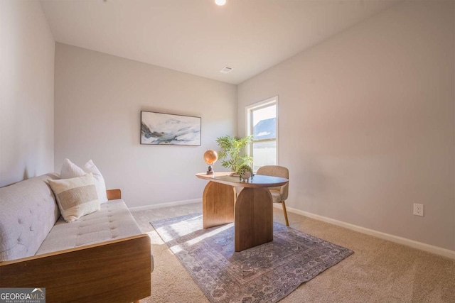 office featuring light colored carpet and baseboards