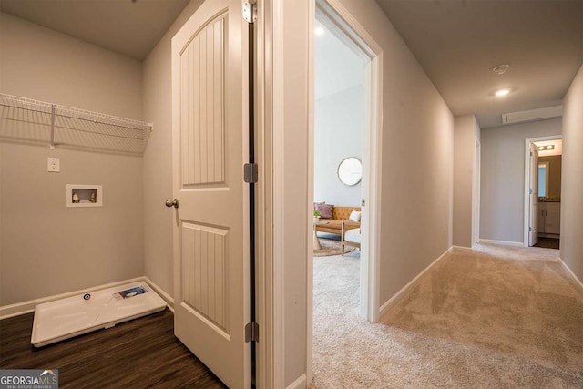 washroom featuring laundry area, carpet flooring, hookup for a washing machine, and baseboards