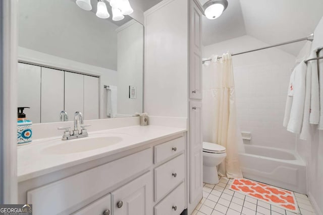 bathroom with toilet, tile patterned flooring, shower / bath combo with shower curtain, vaulted ceiling, and vanity