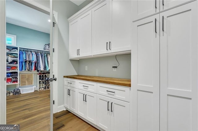 washroom featuring light wood finished floors