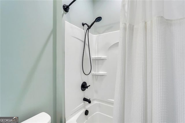 full bathroom with shower / bath combo with shower curtain