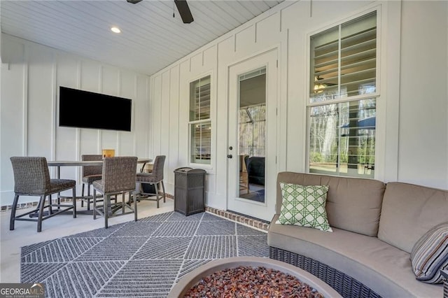 view of patio / terrace featuring an outdoor hangout area, ceiling fan, and outdoor dining area