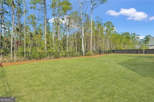 view of yard featuring fence