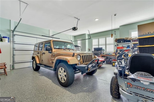 garage featuring a garage door opener