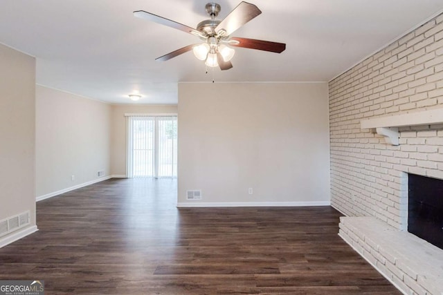 unfurnished living room with baseboards, visible vents, a ceiling fan, dark wood-style flooring, and a fireplace