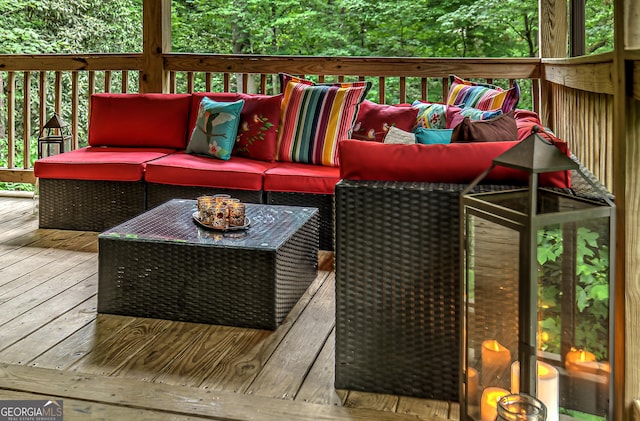 wooden deck with an outdoor hangout area