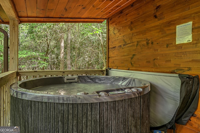 exterior space featuring a hot tub