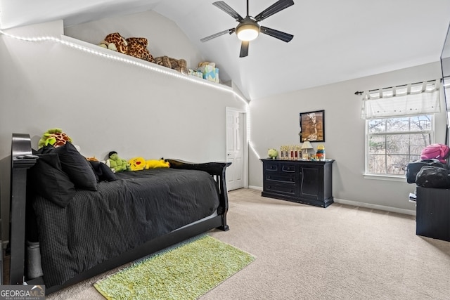 bedroom featuring vaulted ceiling, carpet floors, a ceiling fan, and baseboards