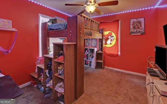 carpeted bedroom with baseboards