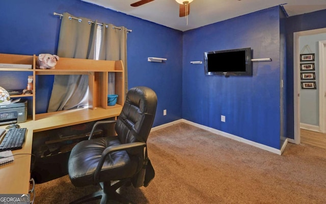 office area featuring ceiling fan, carpet floors, and baseboards