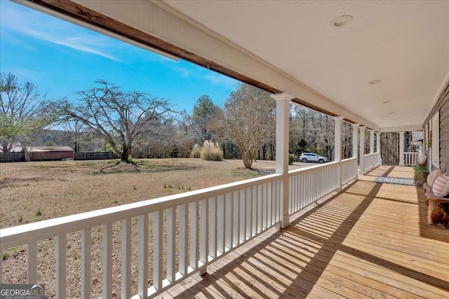 wooden terrace with covered porch