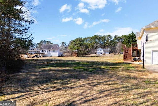 view of yard featuring stairs