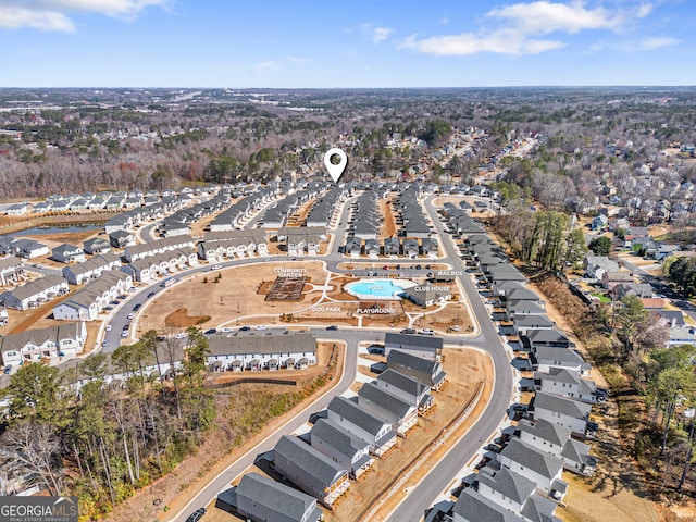 birds eye view of property with a residential view