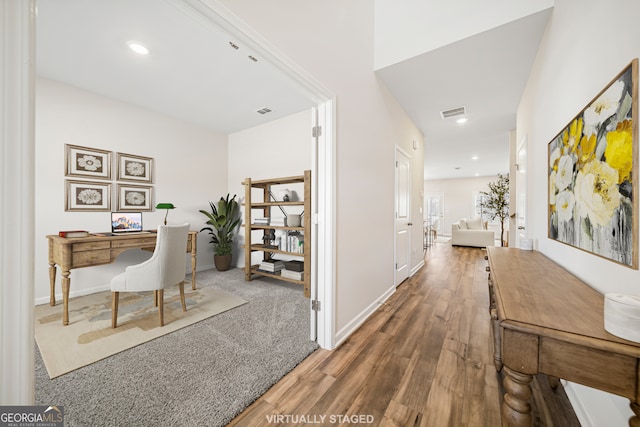 office with recessed lighting, visible vents, and wood finished floors