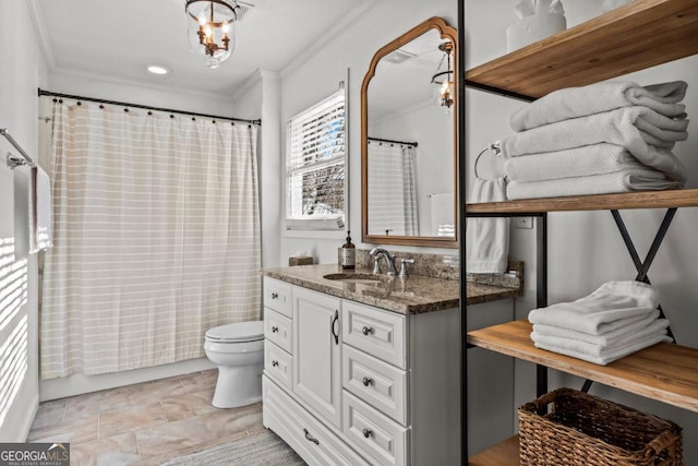 bathroom featuring shower / bath combo, crown molding, vanity, and toilet