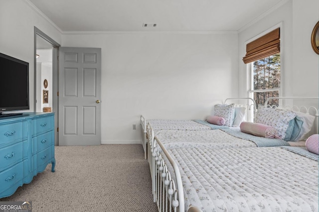 bedroom featuring baseboards, visible vents, light colored carpet, and ornamental molding